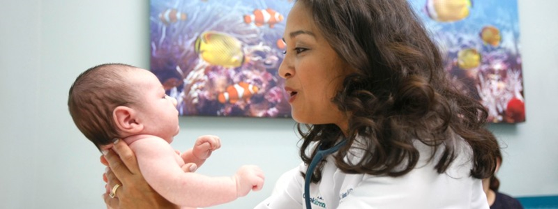 Provider holding baby